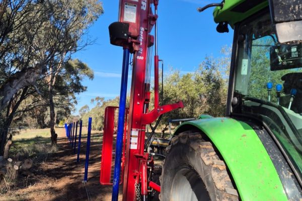 Kinghitter Series 2i 450 tractor-mounted post driver handling concrete, steel, and wooden posts in Australia
