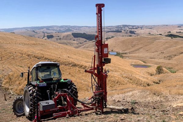 Kinghitter Series 2i 450 tractor-mounted post driver with Dominator Rotational Base handling concrete, steel, and wooden posts across Australian fencing jobs.