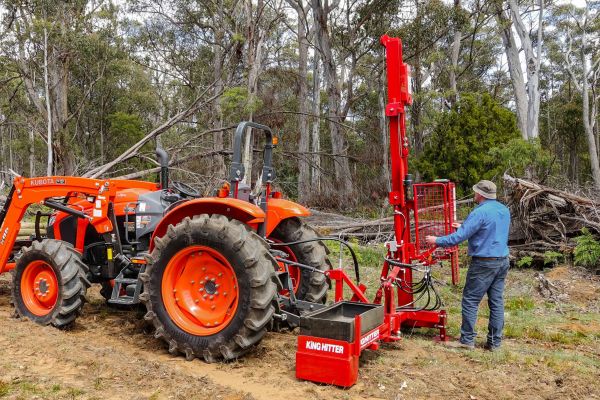 Tractor-mounted Kinghitter Series 2i post driver with safety system