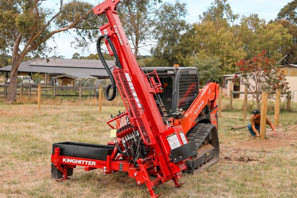 Kinghitter Expander 2i post driver mounted on skidsteer loader