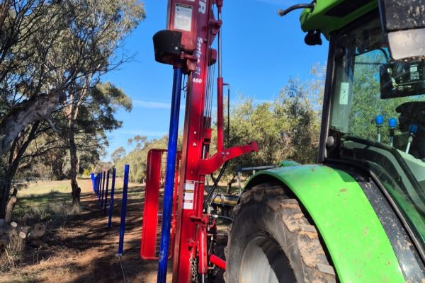 Kinghitter Series 2i 450 tractor-mounted post driver handling concrete, steel, and wooden posts in Australia