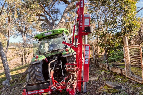 Tractor-mounted Kinghitter Series 2i 450 hydraulic post driver with 25° angle tilt in Australia